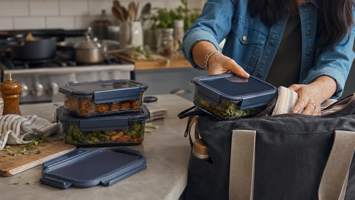 leakproof food storage containers shown in the real-life setting: Sunday leftovers become Monday lunch, then the container travels home in a crowded bag.