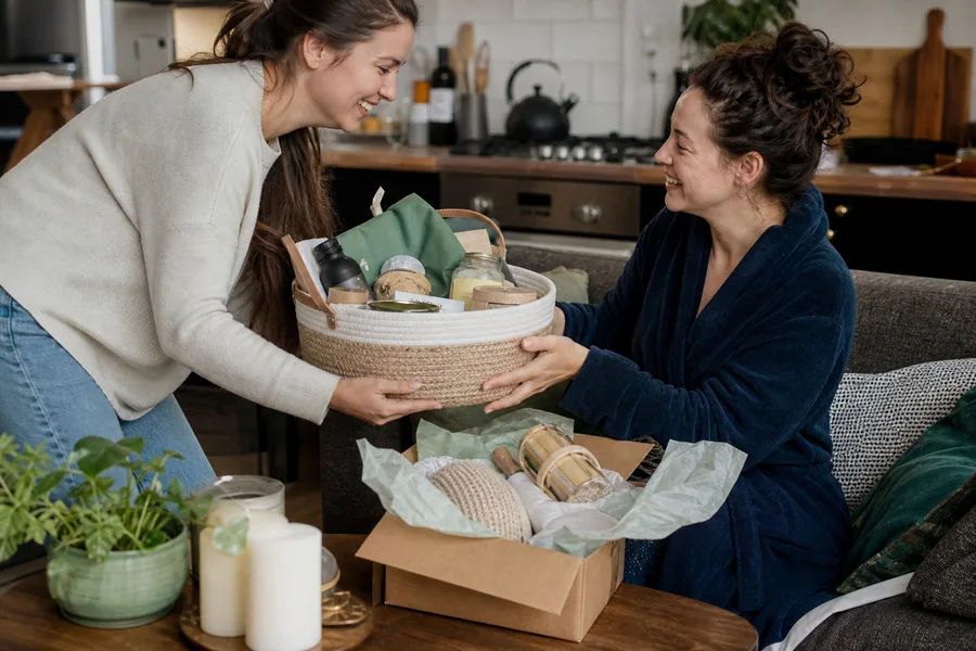 friends and relatives of new parents comparing useful gifts for new parents for the baby receives plenty, while the parents need food, rest, and small moments of convenience.