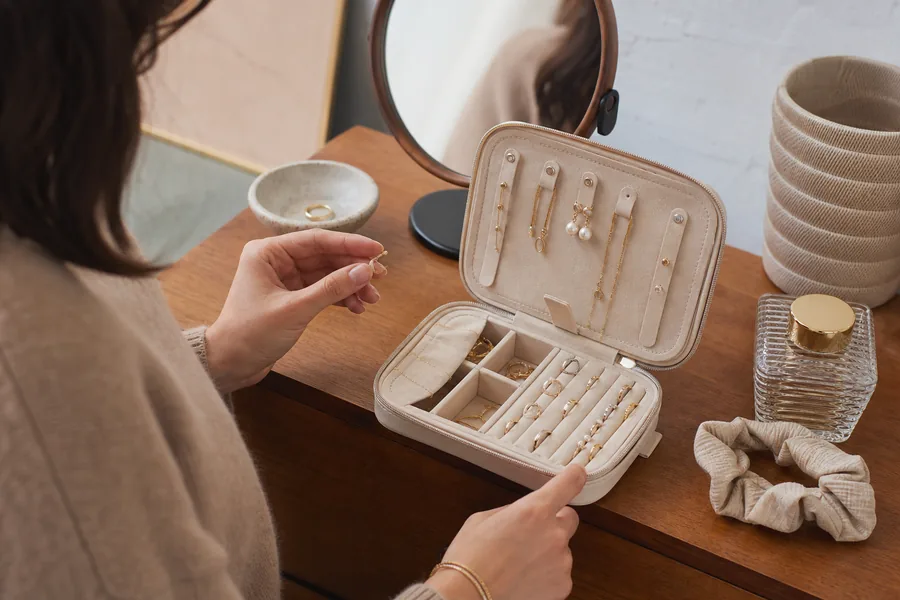 accessory collectors comparing jewelry organizer travel for daily earrings disappear on the dresser and delicate chains tangle during short trips.