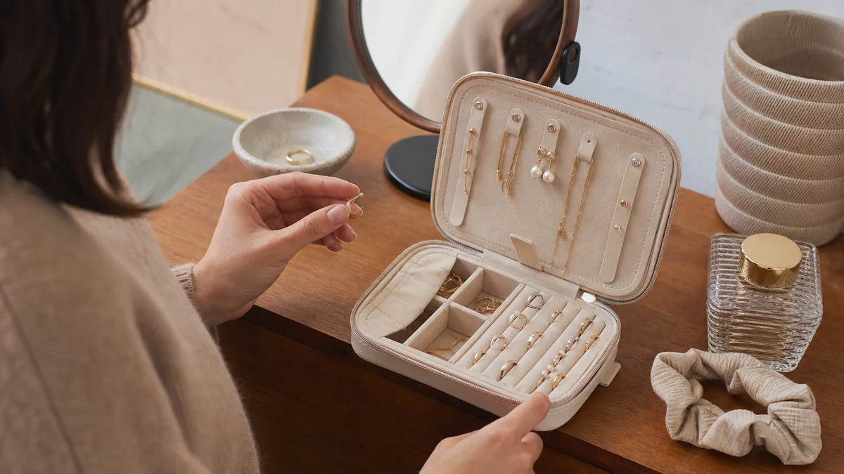 jewelry organizer travel shown in the real-life setting: Daily earrings disappear on the dresser and delicate chains tangle during short trips.
