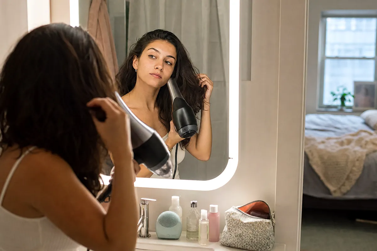 small-space routines considering lighted makeup mirror adjustable in an everyday setting