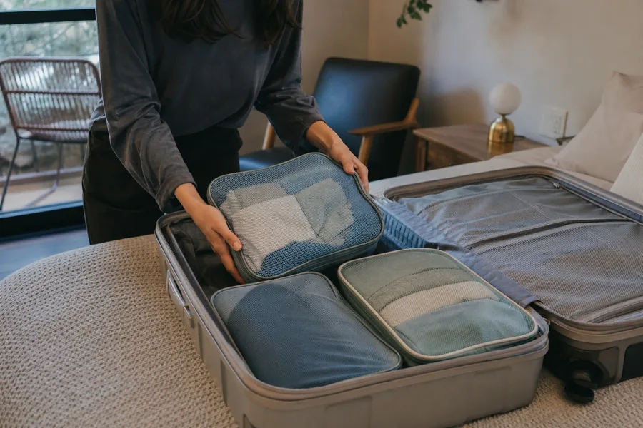 organized travelers comparing packing cubes lightweight for a weekend bag needs separate outfits and laundry without turning packing into a complicated system.